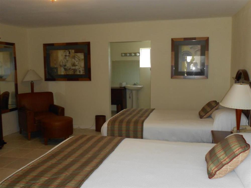 Alvin Extended Stay Quarto foto