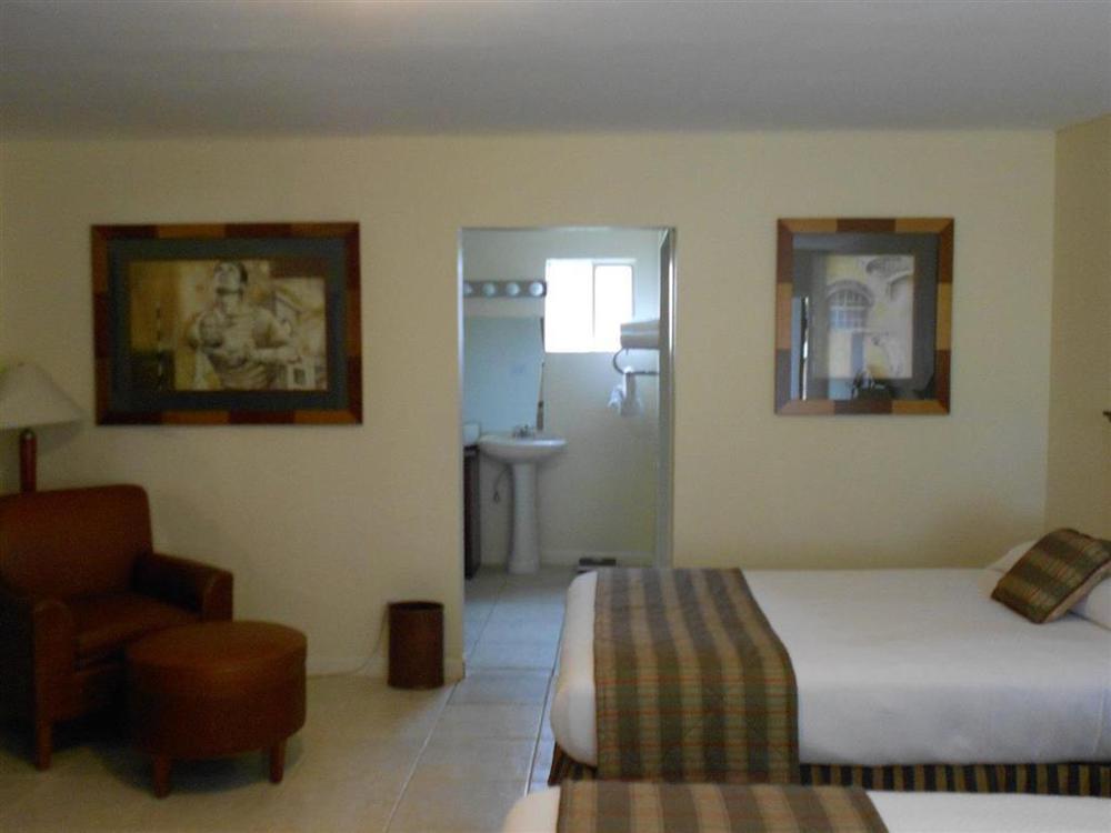 Alvin Extended Stay Quarto foto